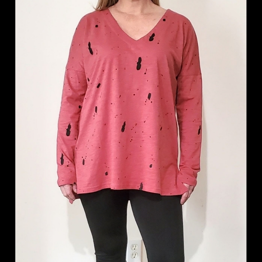 This is a cute painted splattered shirt.